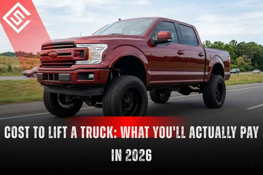 Red Ford F-150 with suspension lift showcasing the real cost to lift a truck in 2026, from kits and labor to upgrades.