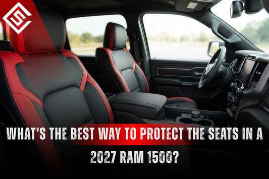 Red and black seat covers fitted inside a 2027 Ram 1500 cabin for everyday seat protection.