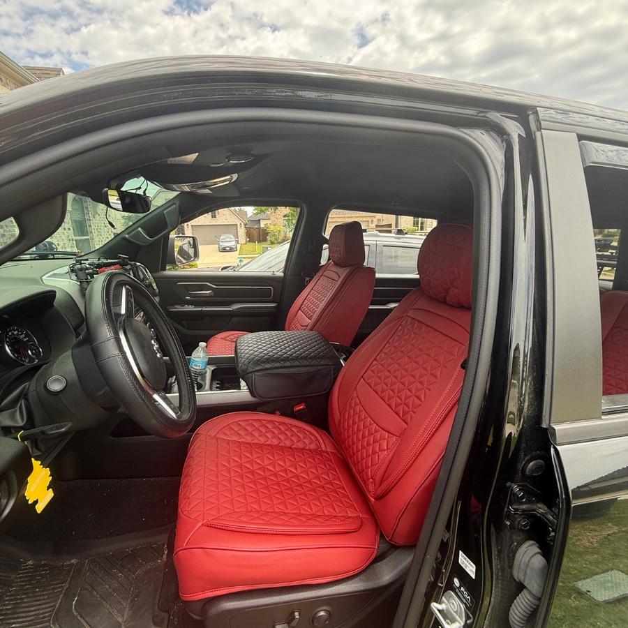 Red and black covers in Dan W.'s 2025 Ram 1500